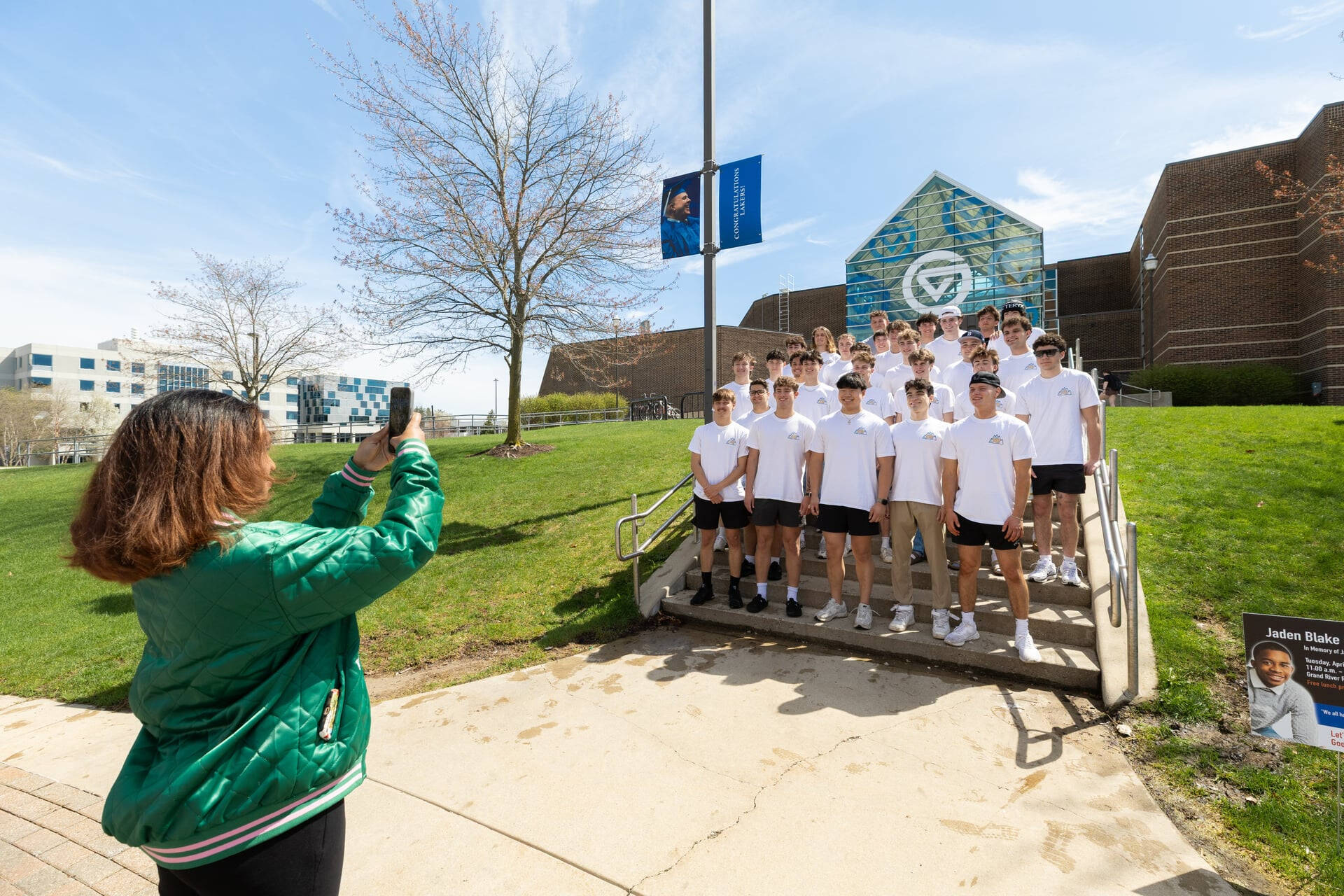 Member of IFC pose for group photo outside of Kirkhof